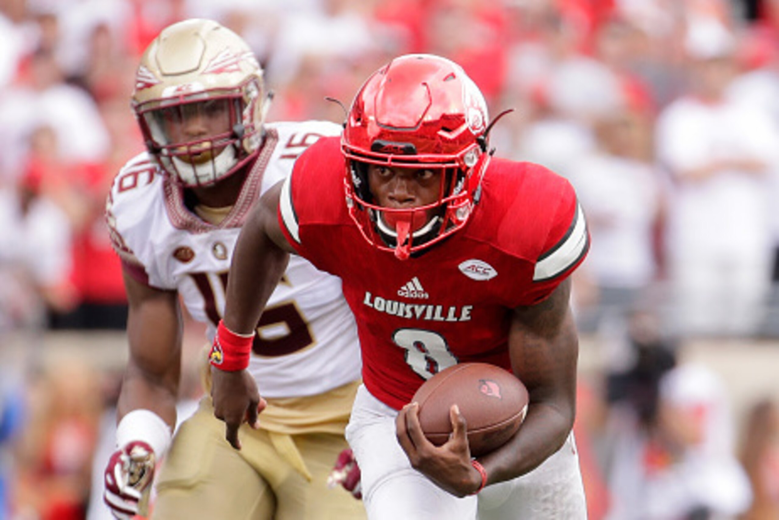LOUISVILLE, KY - SEPTEMBER 17: Lamar Jackson #8 of the Louisville Cardinals runs for a touchdown against the Florida State Seminoles at Papa John's Cardinal Stadium on September 17, 2016 in Louisville, Kentucky. (Photo by Andy Lyons/Getty Images) LOUISVILLE, KY - SEPTEMBER 17: Lamar Jackson #8 of the Louisville Cardinals runs for a touchdown against the Florida State Seminoles at Papa John's Cardinal Stadium on September 17, 2016 in Louisville, Kentucky. (Photo by Andy Lyons/Getty Images)