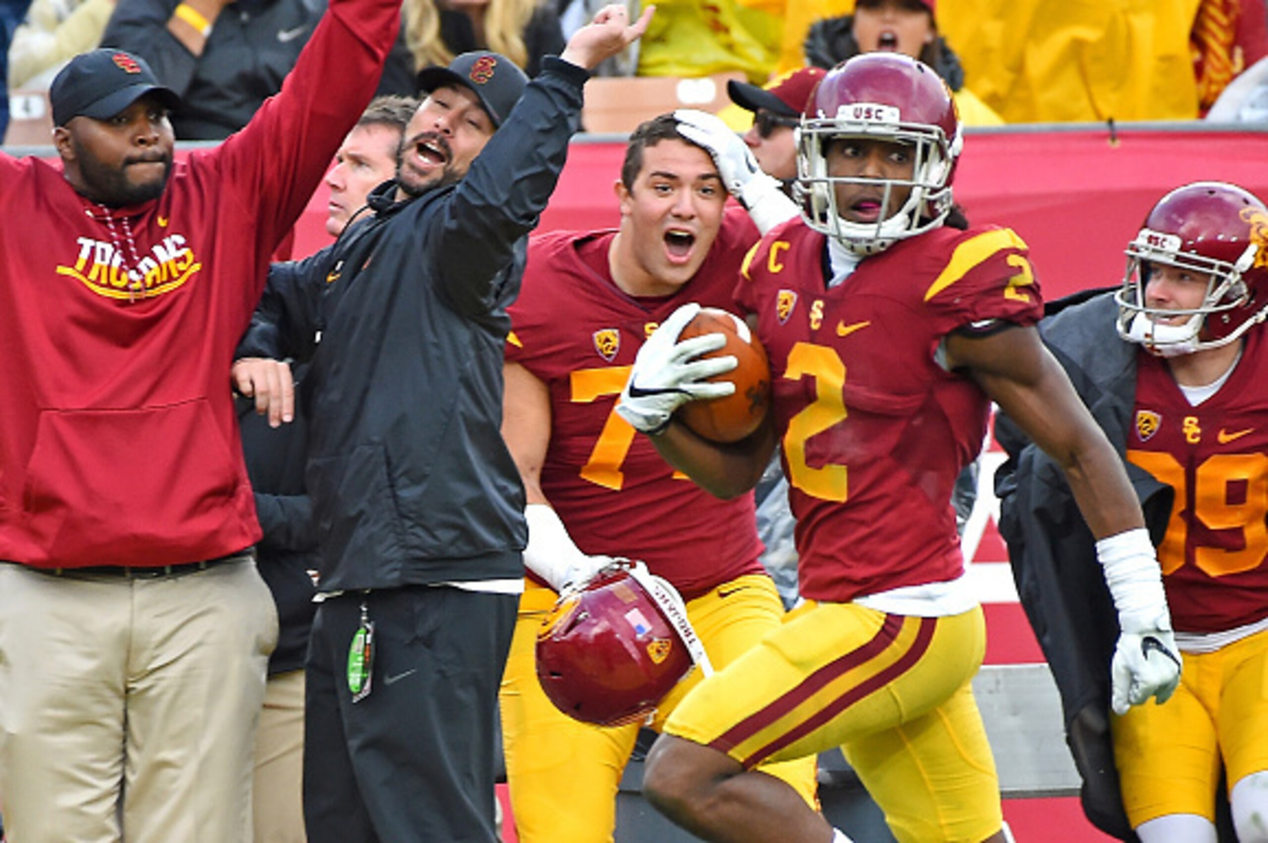 LOS ANGELES, CA - NOVEMBER 26: Adoree' Jackson #2 of the USC Trojans runs down the sideline on a 96 yard touch down run in the third quarter of the game against the Notre Dame Fighting Irish at the Los Angeles Memorial Coliseum on November 26, 2016 in Lo LOS ANGELES, CA - NOVEMBER 26: Adoree' Jackson #2 of the USC Trojans runs down the sideline on a 96 yard touch down run in the third quarter of the game against the Notre Dame Fighting Irish at the Los Angeles Memorial Coliseum on November 26, 2016 in Lo