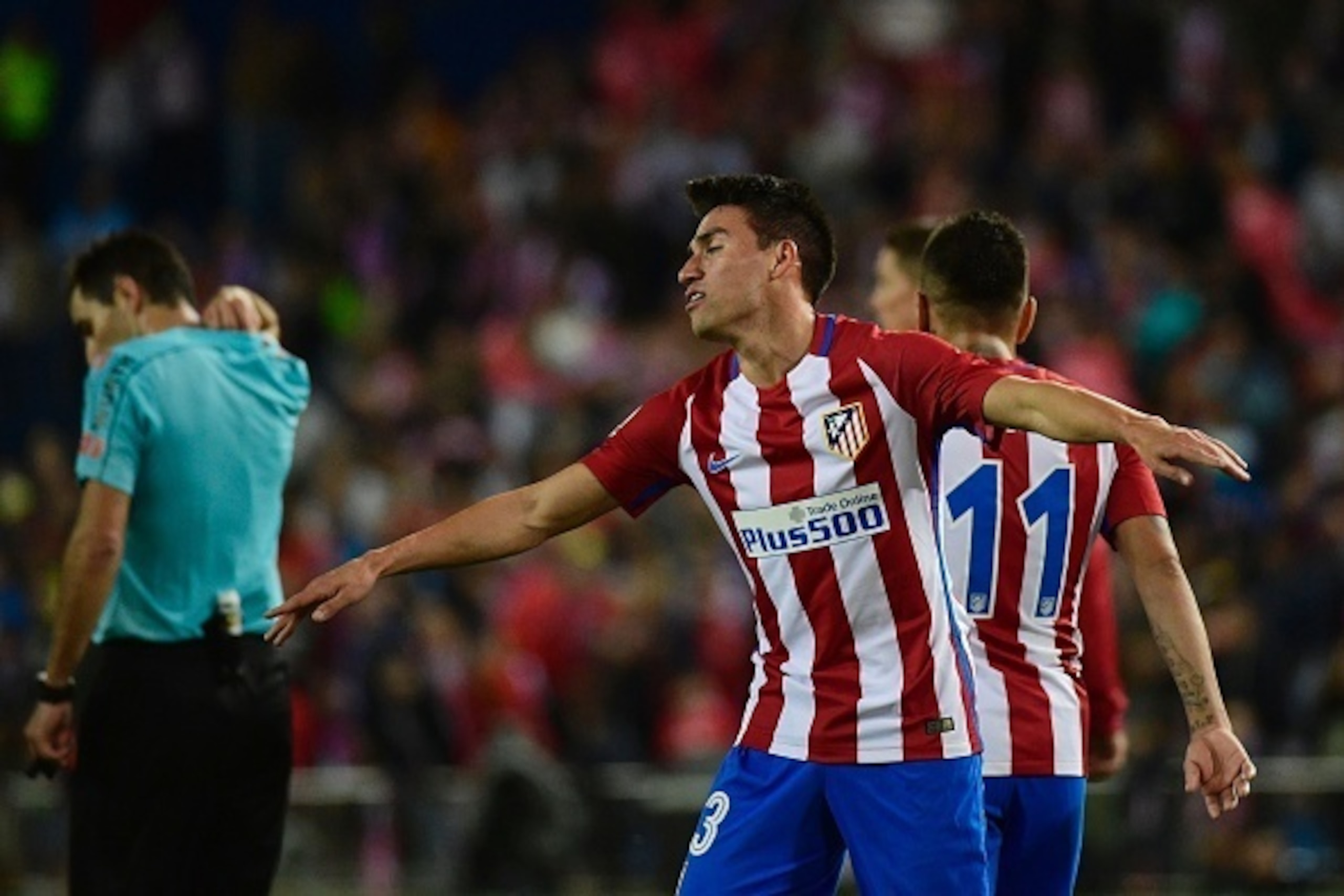 Atletico Madrid's Argentinian midfielder Nicolas Gaitan celebrates his second goal during the Spanish league football match Club Atletico de Madrid vs Granada FC at the Vicente Calderon stadium in Madrid on October 15, 2016.
Atletico won 7-1. / AFP / PIER