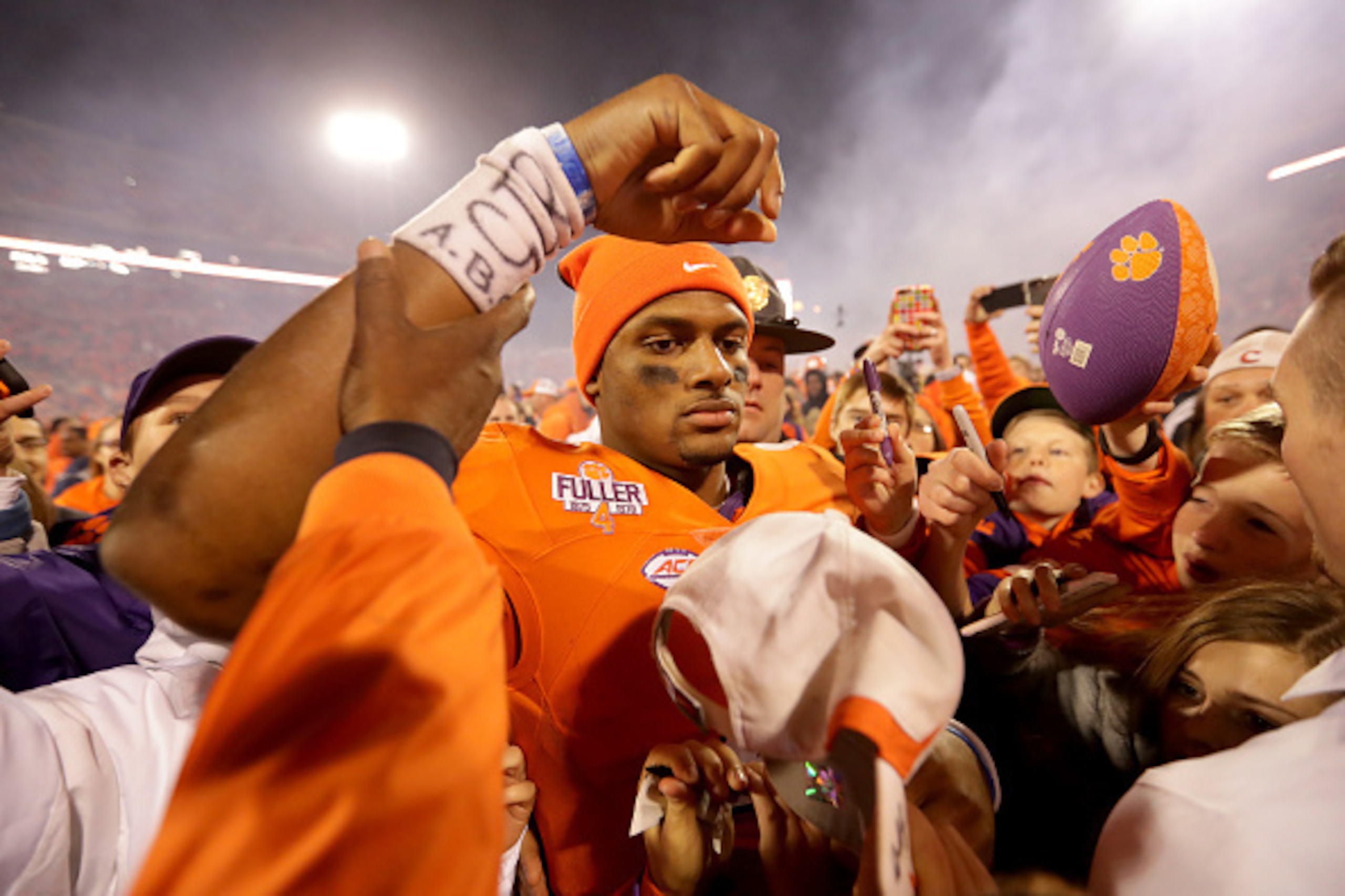 CLEMSON, SC - NOVEMBER 26:  Deshaun Watson #4 of the Clemson Tigers walks off the field against the South Carolina Gamecocks during their game at Memorial Stadium on November 26, 2016 in Clemson, South Carolina.  (Photo by Streeter Lecka/Getty Images)