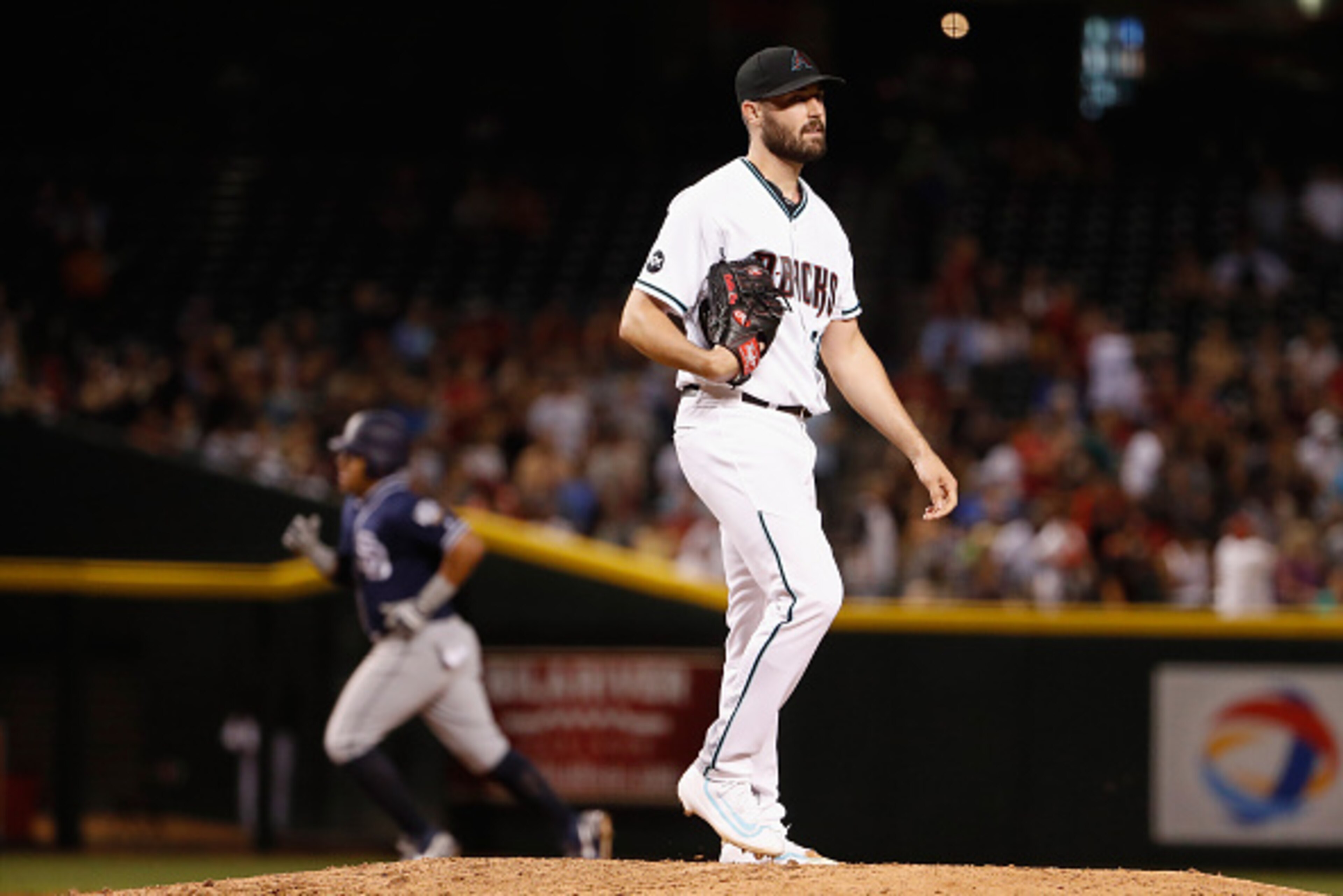 PHOENIX, AZ - MAY 27:  Starting pitcher Robbie Ray #38 of the Arizona Diamondbacks reacts after giving up a solo home run to Yangervis Solarte #26 of the San Diego Padres during the fifth inning of the MLB game at Chase Field on May 27, 2016 in Phoenix, A