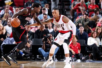 PORTLAND, OR - NOVEMBER 27: Patrick Beverley #2 of the Houston Rockets handles the ball during the game against Damian Lillard #0 of the Portland Trail Blazers on November 27, 2016 at the Moda Center in Portland, Oregon. NOTE TO USER: User expressly ackno