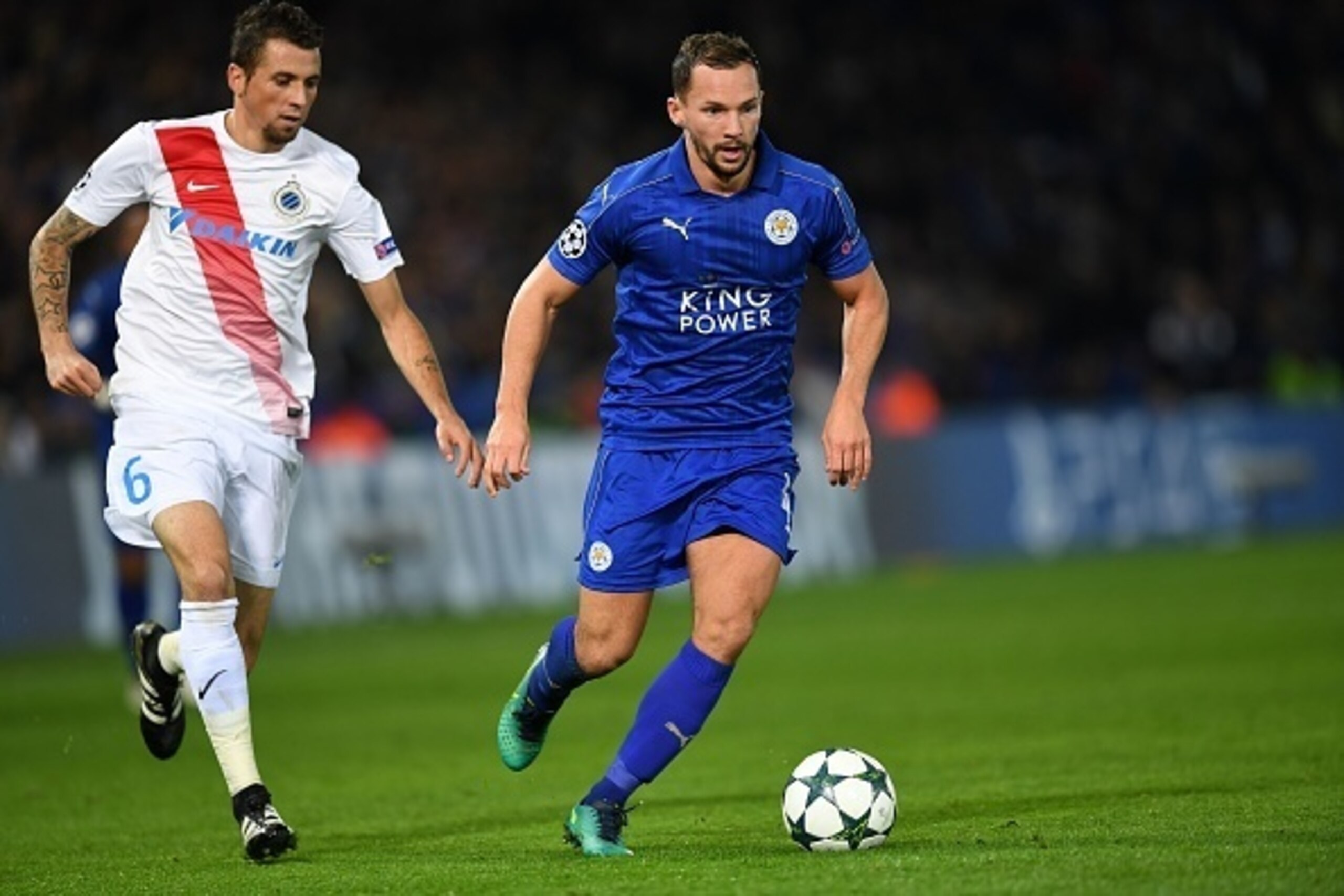 Leicester City's English midfielder Danny Drinkwater (C) vies with Club Brugge's Brazilian midfielder Claudemir during the UEFA Champions League group G football match between Leicester City and Club Brugge at the King Power Stadium in Leicester, central 