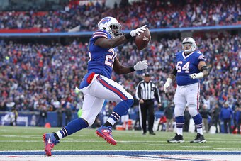 ORCHARD PARK, NY - NOVEMBER 27: LeSean McCoy #25 of the Buffalo Bills celebrates as he scores a touchdown in the second quarter during NFL game action against the Jacksonville Jaguars at New Era Field on November 27, 2016 in Orchard Park, New York. (Photo