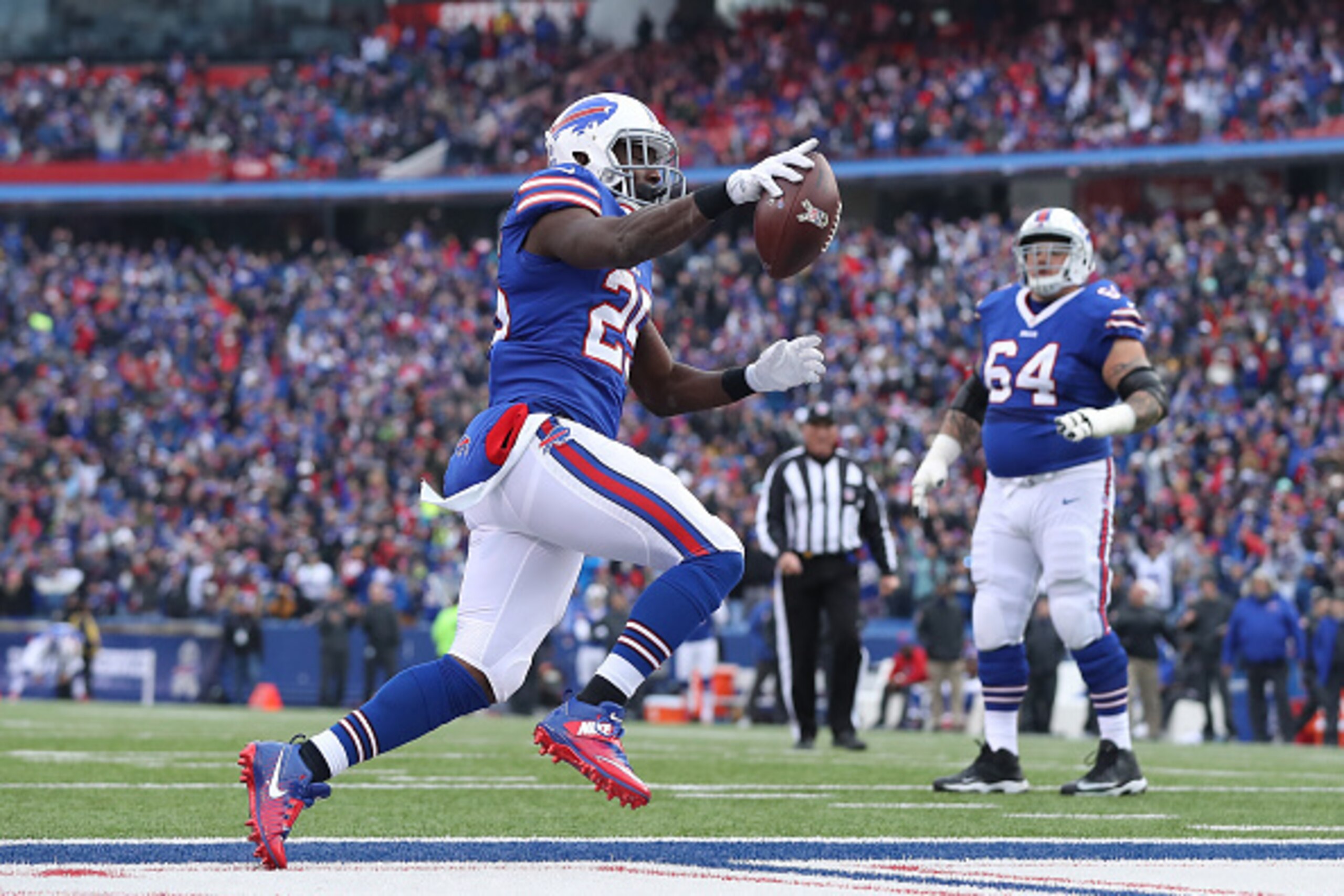ORCHARD PARK, NY - NOVEMBER 27: LeSean McCoy #25 of the Buffalo Bills celebrates as he scores a touchdown in the second quarter during NFL game action against the Jacksonville Jaguars at New Era Field on November 27, 2016 in Orchard Park, New York. (Photo