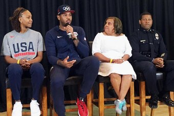 Lakers staffer Jason McDevitt thought up the idea for the Lakers to host basketball games between police and youths while attending Carmelo Anthony's town hall conversation in L.A. over the summer.