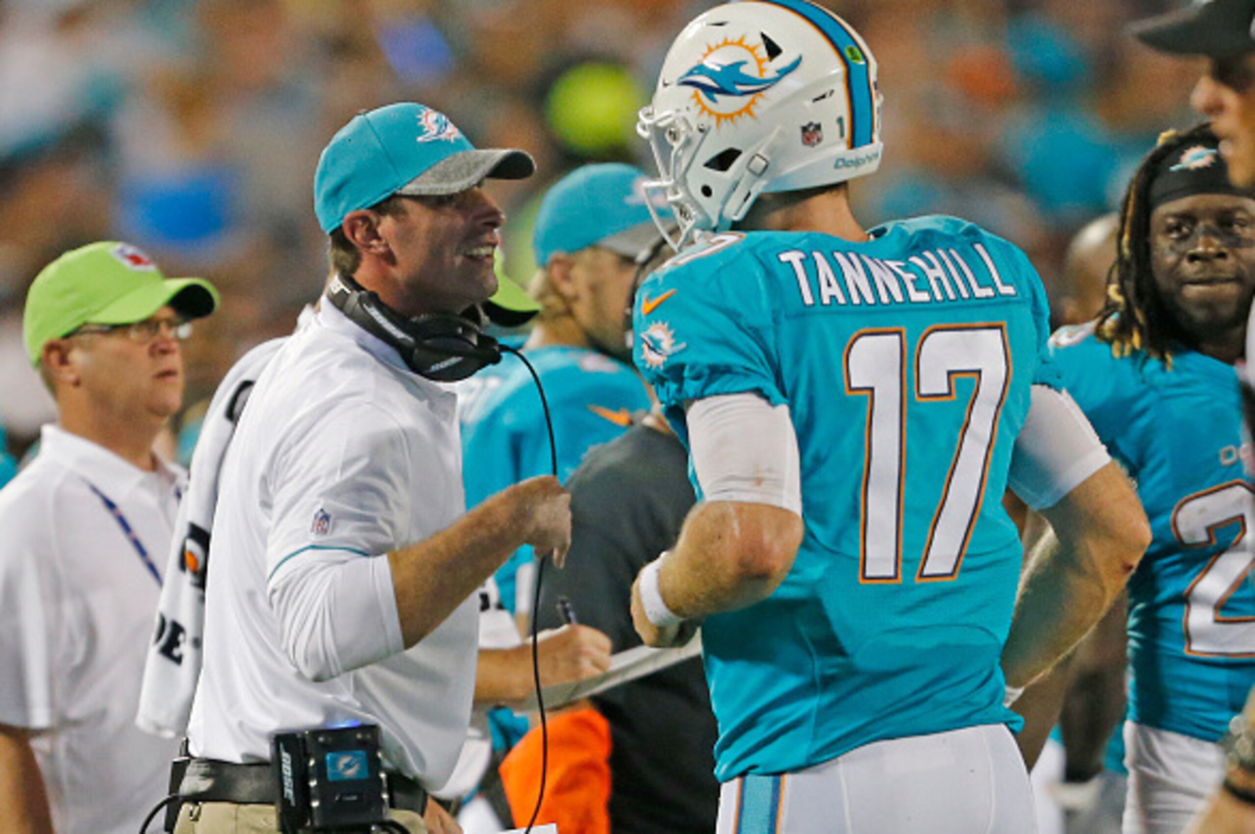 ORLANDO, FL - AUGUST 25: Head coach Adam Gase congratulates Ryan Tannehill #17 of the Miami Dolphins after a touchdown against the Atlanta Falcons during a preseason game on August 25, 2016 at Camping World Stadium in Orlando, Florida. The Dolphins defeat
