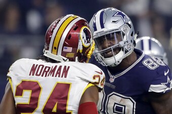 ARLINGTON, TX - NOVEMBER 24:   Dez Bryant #88 of the Dallas Cowboys argues with Josh Norman #24 of the Washington Redskins after catching a pass in their game at AT&T Stadium on November 24, 2016 in Arlington, Texas.  (Photo by Ronald Martinez/Getty Image
