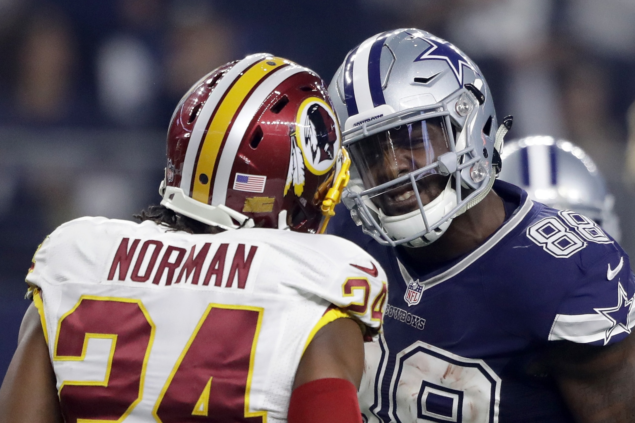 ARLINGTON, TX - NOVEMBER 24:   Dez Bryant #88 of the Dallas Cowboys argues with Josh Norman #24 of the Washington Redskins after catching a pass in their game at AT&T Stadium on November 24, 2016 in Arlington, Texas.  (Photo by Ronald Martinez/Getty Image
