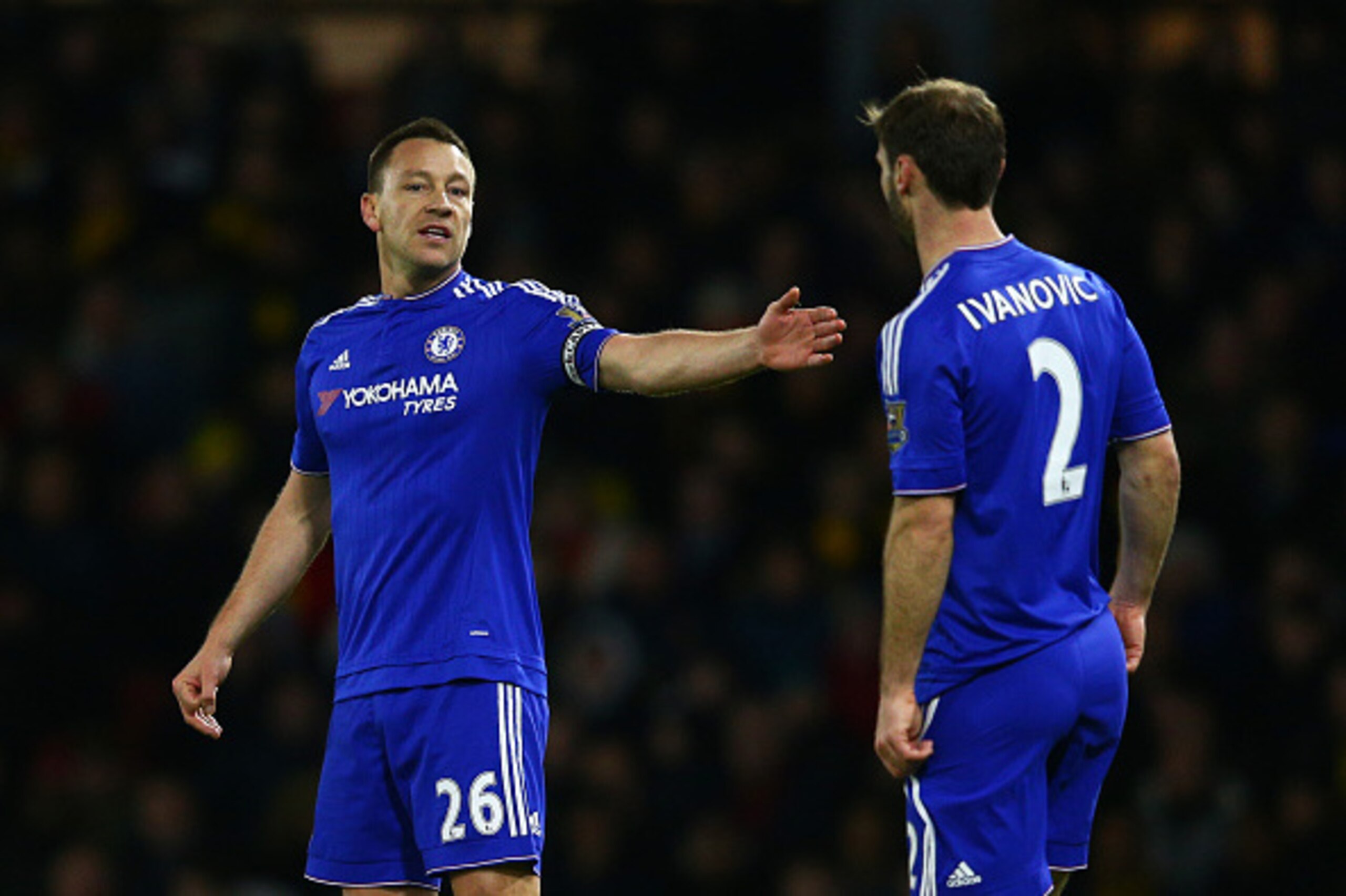 WATFORD, ENGLAND - FEBRUARY 03:  John Terry of Chelsea speaks with Branislav Ivanovic of Chelsea during the Barclays Premier League match between Watford and Chelsea at Vicarage Road on February 3, 2016 in Watford, England.  (Photo by Clive Mason/Getty Im