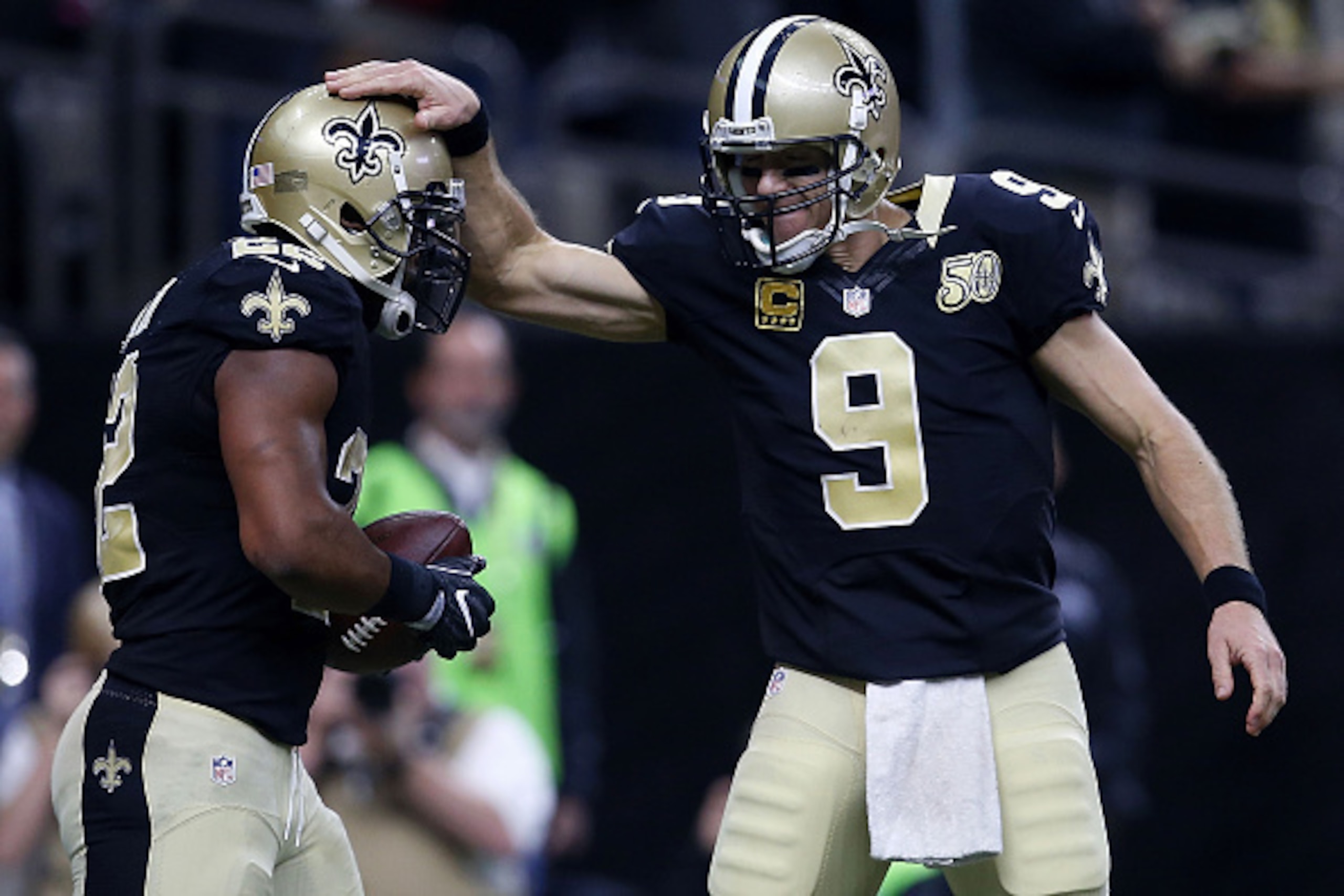 NEW ORLEANS, LA - NOVEMBER 27: Mark Ingram #22 of the New Orleans Saints celebrates a touchdown with Drew Brees #9 during the second half of a game against the Los Angeles Rams at the Mercedes-Benz Superdome on November 27, 2016 in New Orleans, Louisiana.