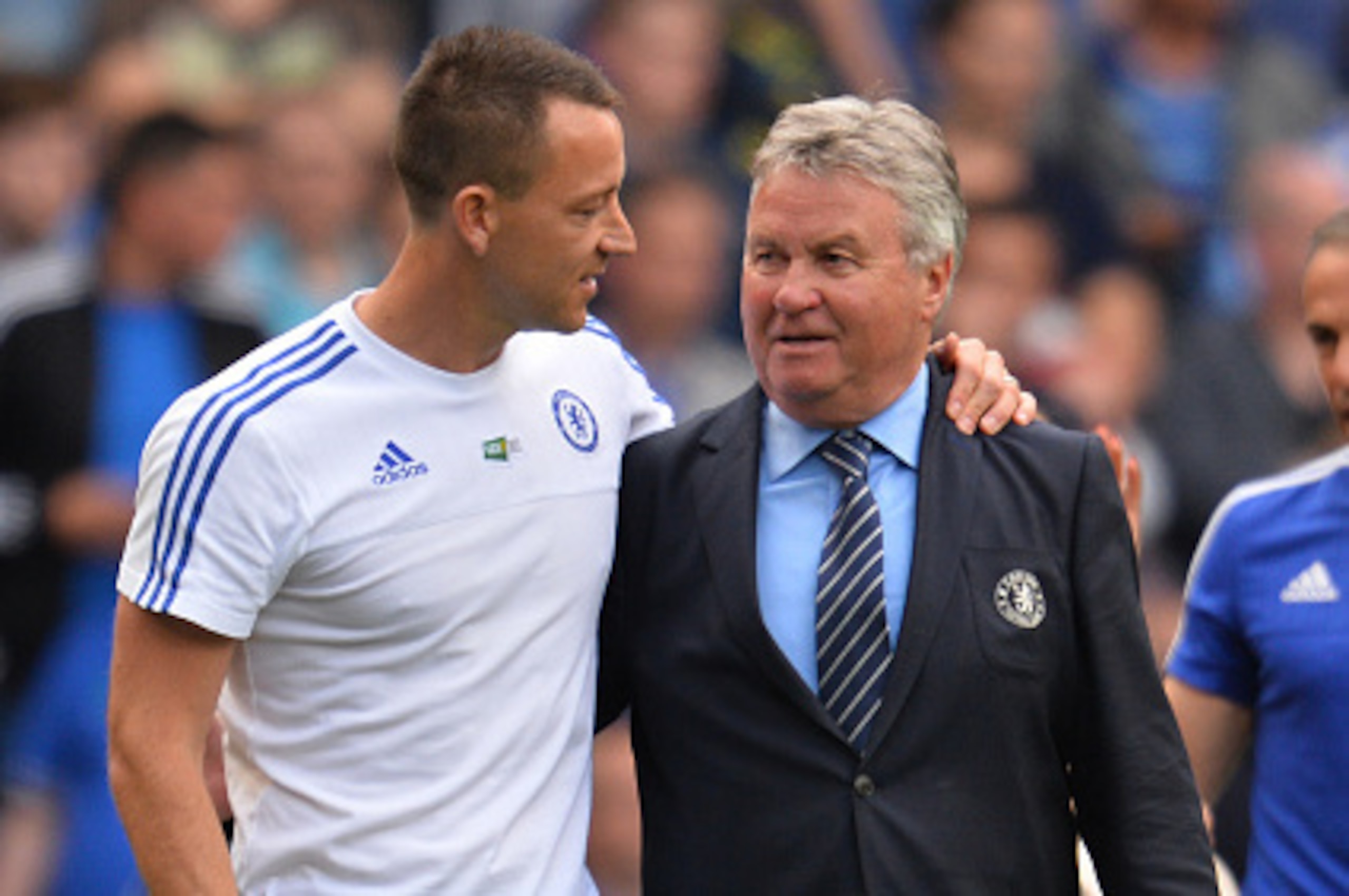 Chelsea's English defender John Terry (L) talks with Chelsea's Dutch interim manager Guus Hiddink after the English Premier League football match between Chelsea and Leicester City at Stamford Bridge in London on May 15, 2016. / AFP / GLYN KIRK / RESTRICT Chelsea's English defender John Terry (L) talks with Chelsea's Dutch interim manager Guus Hiddink after the English Premier League football match between Chelsea and Leicester City at Stamford Bridge in London on May 15, 2016. / AFP / GLYN KIRK / RESTRICT