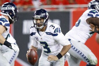 TAMPA, FL - NOVEMBER 27: Russell Wilson #3 of the Seattle Seahawks looks to pass against the Tampa Bay Buccaneers during the game at Raymond James Stadium on November 27, 2016 in Tampa, Florida. The Buccaneers defeated the Seahawks 14-5. (Photo by Joe Rob