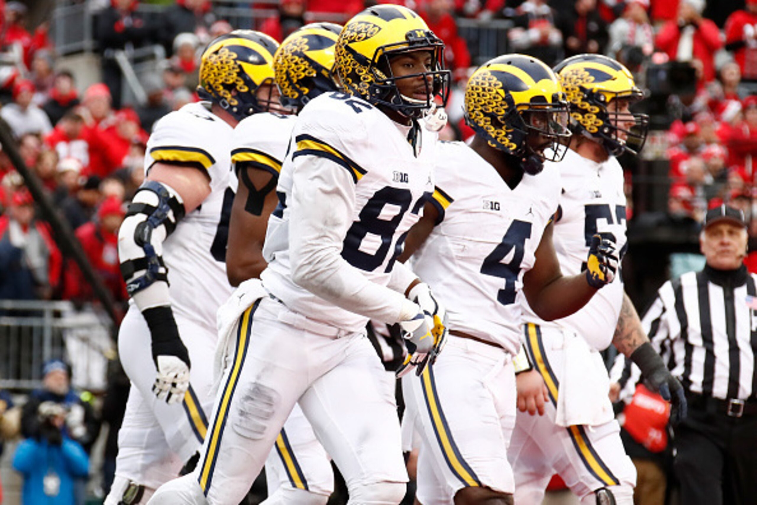 COLUMBUS, OH - NOVEMBER 26:   Amara Darboh #82 of the Michigan Wolverines celebrates after catching a touchdown pass in overtime against the Ohio State Buckeyes at Ohio Stadium on November 26, 2016 in Columbus, Ohio.  (Photo by Gregory Shamus/Getty Images