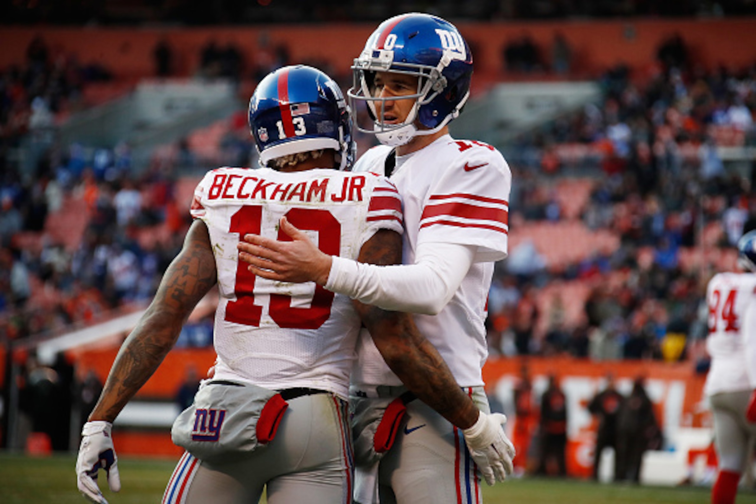 CLEVELAND, OH - NOVEMBER 27:  Odell Beckham #13 of the New York Giants celebrates his touchdown with Eli Manning #10 during the fourth quarter against the Cleveland Browns at FirstEnergy Stadium on November 27, 2016 in Cleveland, Ohio. (Photo by Gregory S