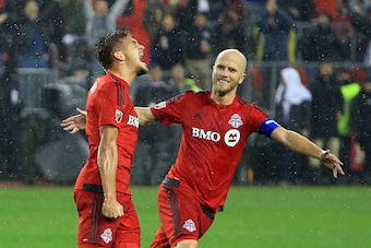 TORONTO, ON - NOVEMBER 30:  Nick Hagglund #6 of Toronto FC celebrates a goal with Michael Bradley #4 during the second half of the MLS Eastern Conference Final, Leg 2 game against Montreal Impact at BMO Field on November 30, 2016 in Toronto, Ontario, Cana