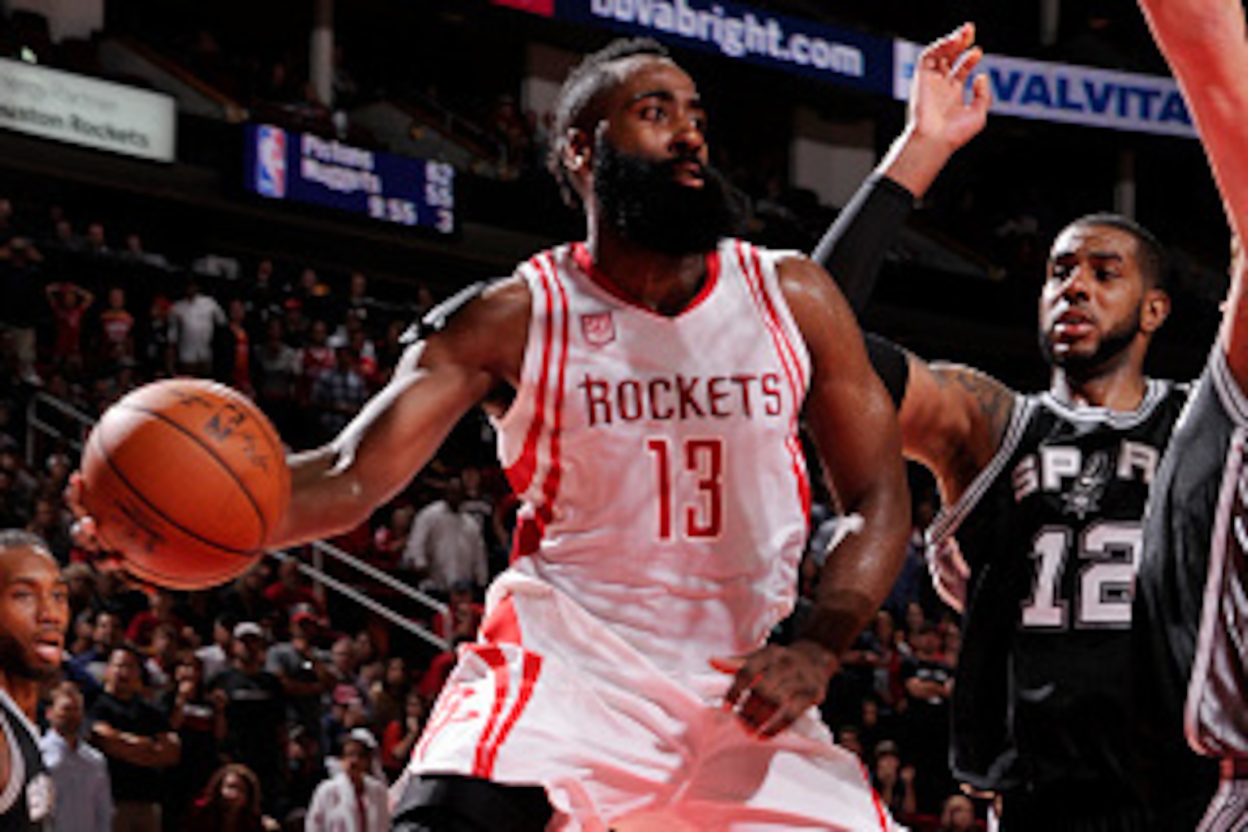 HOUSTON, TX - NOVEMBER 12:  James Harden #13 of the Houston Rockets passes the ball during a game against the San Antonio Spurs on November 12, 2016 at the Toyota Center in Houston, Texas. NOTE TO USER: User expressly acknowledges and agrees that, by down