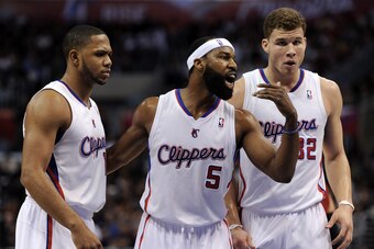 LOS ANGELES, CA - JANUARY 12:  Baron Davis #5 of the Los Angeles Clippers gathers Blake Griffin #32 and Eric Gordon #10 for a chat during the game against the Miami Heat at Staples Center on January 12, 2011 in Los Angeles, California.  NOTE TO USER: User
