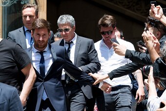 BARCELONA, SPAIN - JUNE 02: Lionel Messi leaves the courthouse followed by his father Jorge Horacio Messi (2nd R) and his brother Rodrigo Messi (R) on June 2, 2016 in Barcelona, Spain. Lionel Messi and his father Jorge Messi, who manages his financial aff