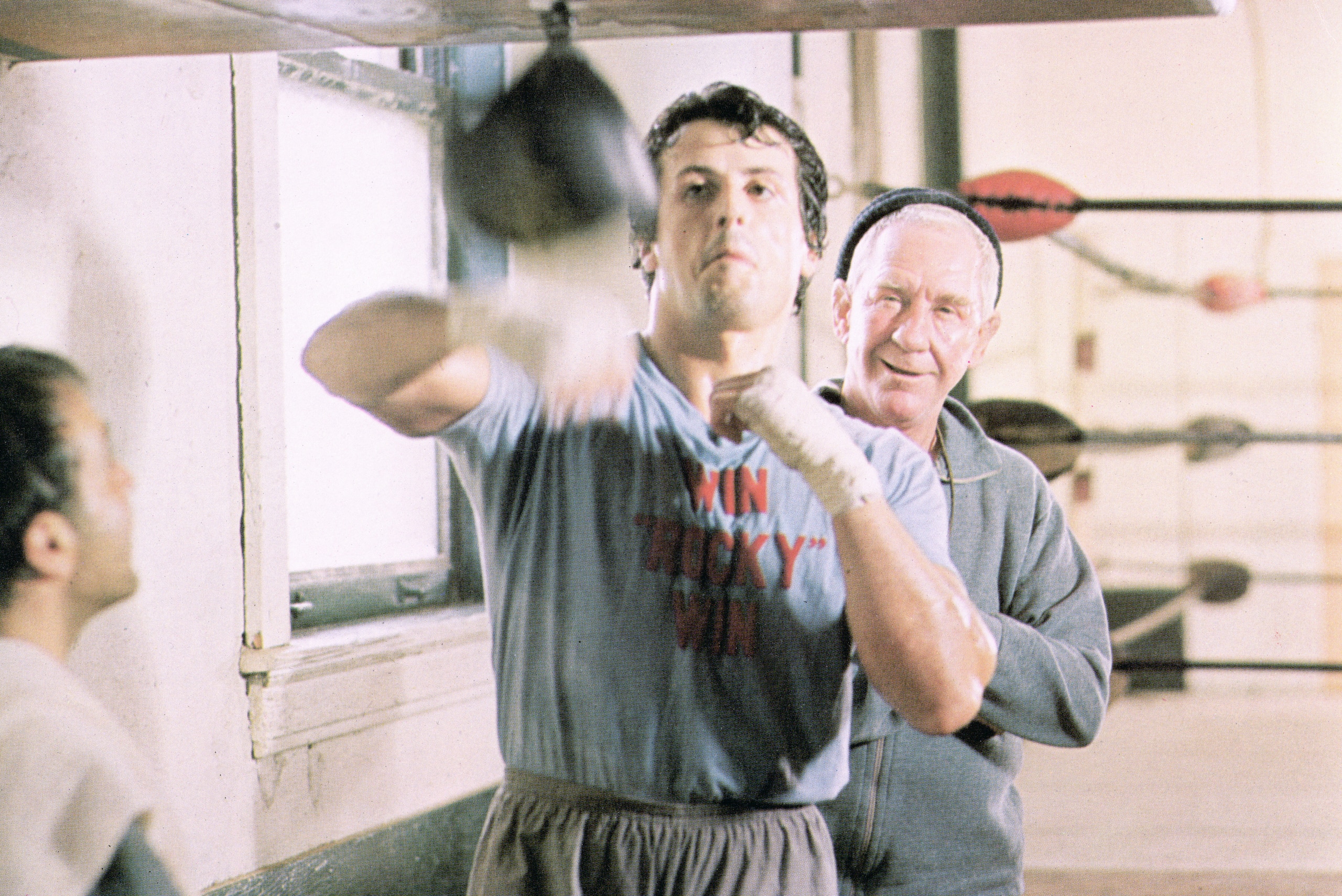 Rocky works out under the watchful eye of trainer Mickey, played by Burgess Meredith.
