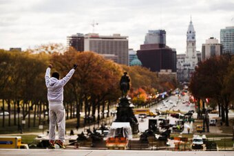 Alex Carrillo of Ecuador imitates Rocky on the steps of the Philadelphia Museum of Art on November 21, 2016.