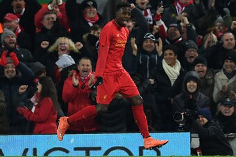 Liverpool's Belgian striker Divock Origi celebrates scoring his team's first goal during the EFL (English Football League) Cup quarter-final football match between Liverpool and Leeds United at Anfield in Liverpool, north west England on November 29, 2016