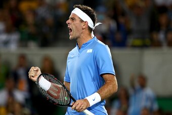 RIO DE JANEIRO, BRAZIL - AUGUST 07:  Juan Martin Del Potro reacts after winning a point against Novak Djokovic of Serbia in their singles match on Day 2 of the Rio 2016 Olympic Games at the Olympic Tennis Centre on August 7, 2016 in Rio de Janeiro, Brazil