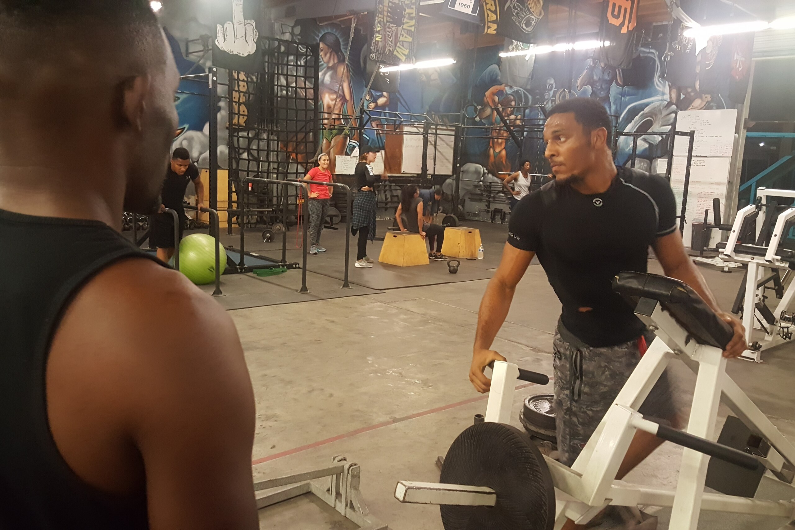 A.J. McKee works out while his dad and trainer, Antonio, watches.