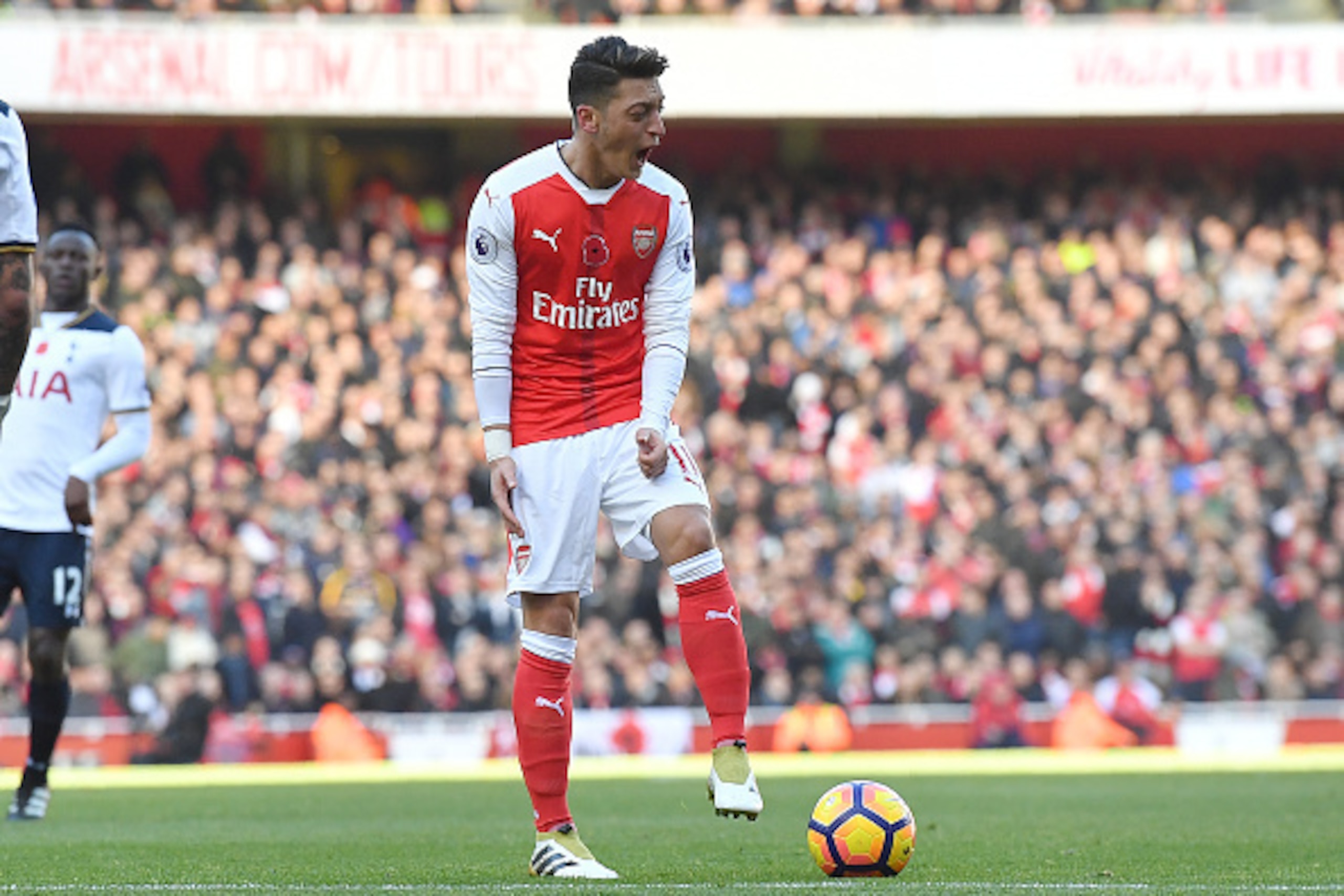 Arsenal's German midfielder Mesut Ozil reacts after being called off-side during the English Premier League football match between Arsenal and Tottenham Hotspur at the Emirates Stadium in London on November 6, 2016.  / AFP / BEN STANSALL / RESTRICTED TO E