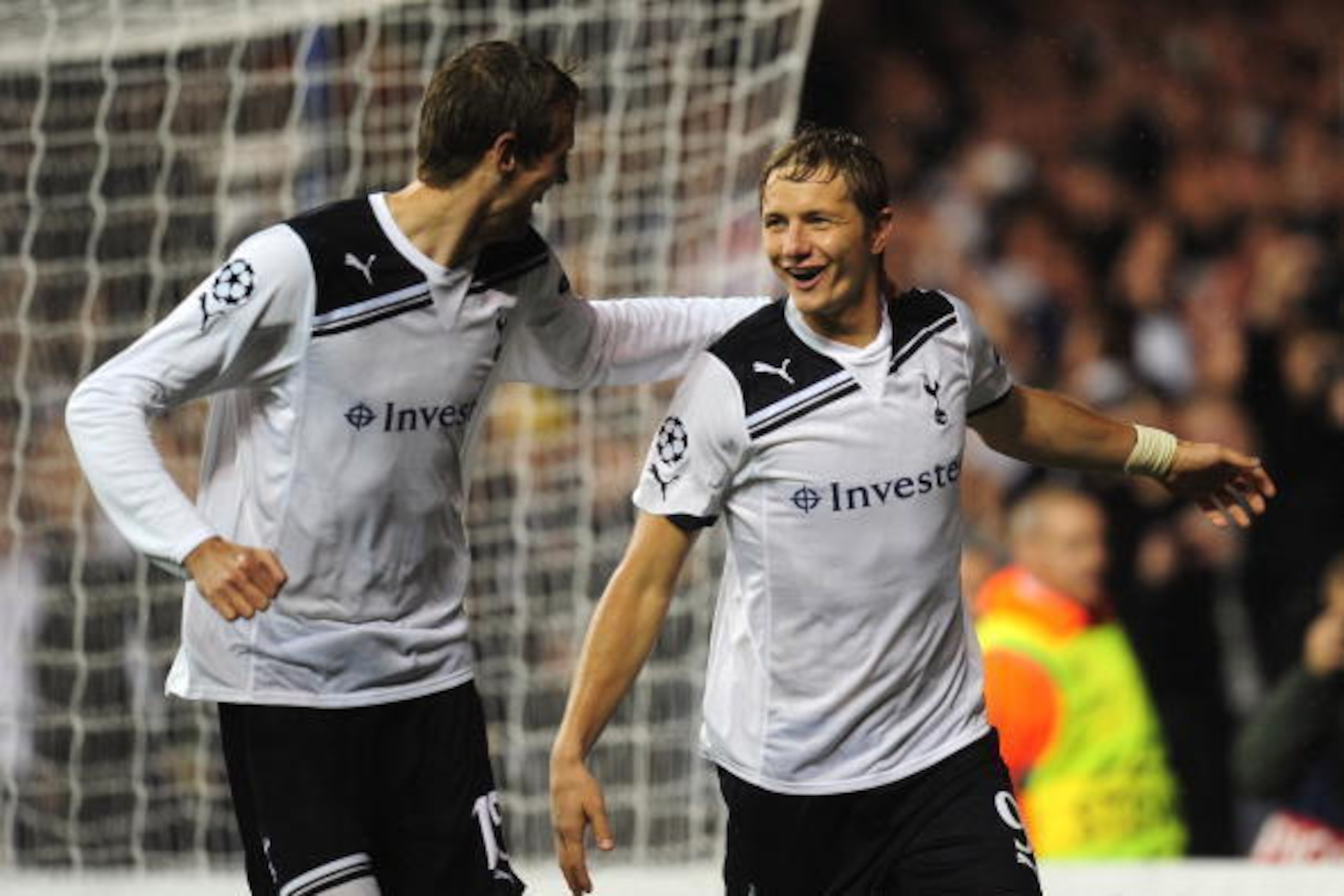 LONDON, ENGLAND - SEPTEMBER 29:  Roman Pavlyuchenko of Tottenham celebrates with team mate Peter Crouch after scoring his first penalty during the  UEFA Champions League Group A match between Tottenham Hotspur and FC Twente at White Hart Lane on September