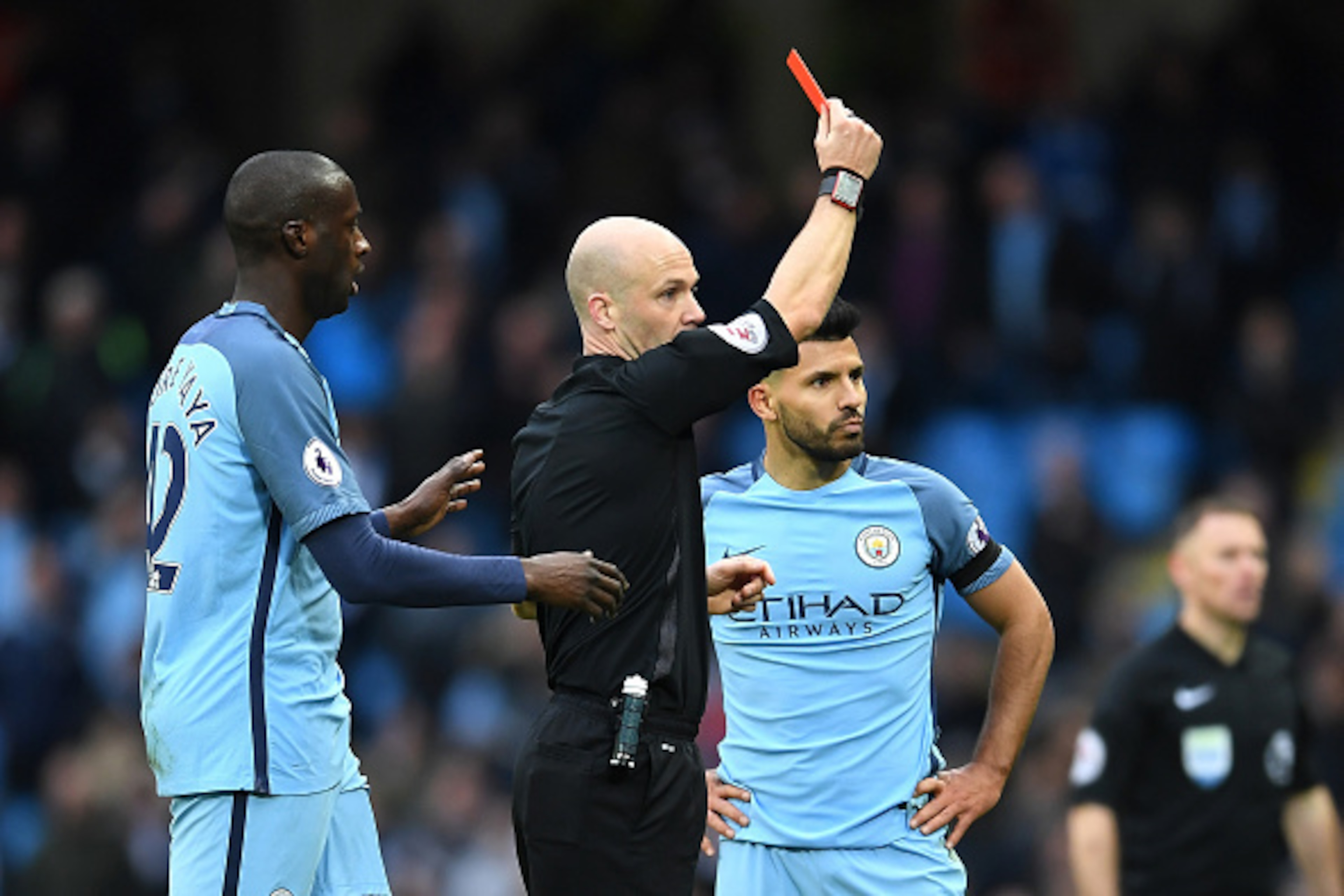 MANCHESTER, ENGLAND - DECEMBER 03: Sergio Aguero (R) of Manchester City is shown a red card by referee Anthony Taylor after fouling David Luiz of Chelsea during the Premier League match between Manchester City and Chelsea at Etihad Stadium on December 3, MANCHESTER, ENGLAND - DECEMBER 03: Sergio Aguero (R) of Manchester City is shown a red card by referee Anthony Taylor after fouling David Luiz of Chelsea during the Premier League match between Manchester City and Chelsea at Etihad Stadium on December 3,