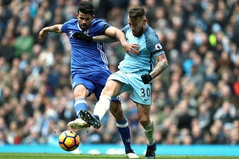 MANCHESTER, ENGLAND - DECEMBER 03: Diego Costa of Chelsea and Nicolas Otamendi of Manchester City during the Premier League match between Manchester City and Chelsea at Etihad Stadium on December 3, 2016 in Manchester, England. (Photo by James Baylis - AM