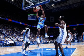 LEXINGTON, KY - DECEMBER 03: Ike Anigbogu #13 of the UCLA Bruins dunks against the Kentucky Wildcats in the first half of the game at Rupp Arena on December 3, 2016 in Lexington, Kentucky. UCLA defeated Kentucky 97-92. (Photo by Joe Robbins/Getty Images)