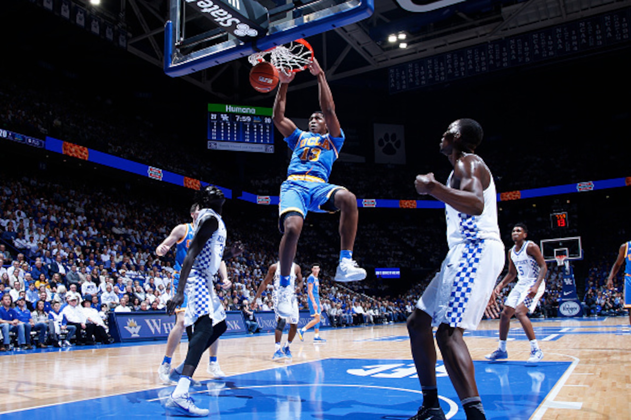 LEXINGTON, KY - DECEMBER 03: Ike Anigbogu #13 of the UCLA Bruins dunks against the Kentucky Wildcats in the first half of the game at Rupp Arena on December 3, 2016 in Lexington, Kentucky. UCLA defeated Kentucky 97-92. (Photo by Joe Robbins/Getty Images)