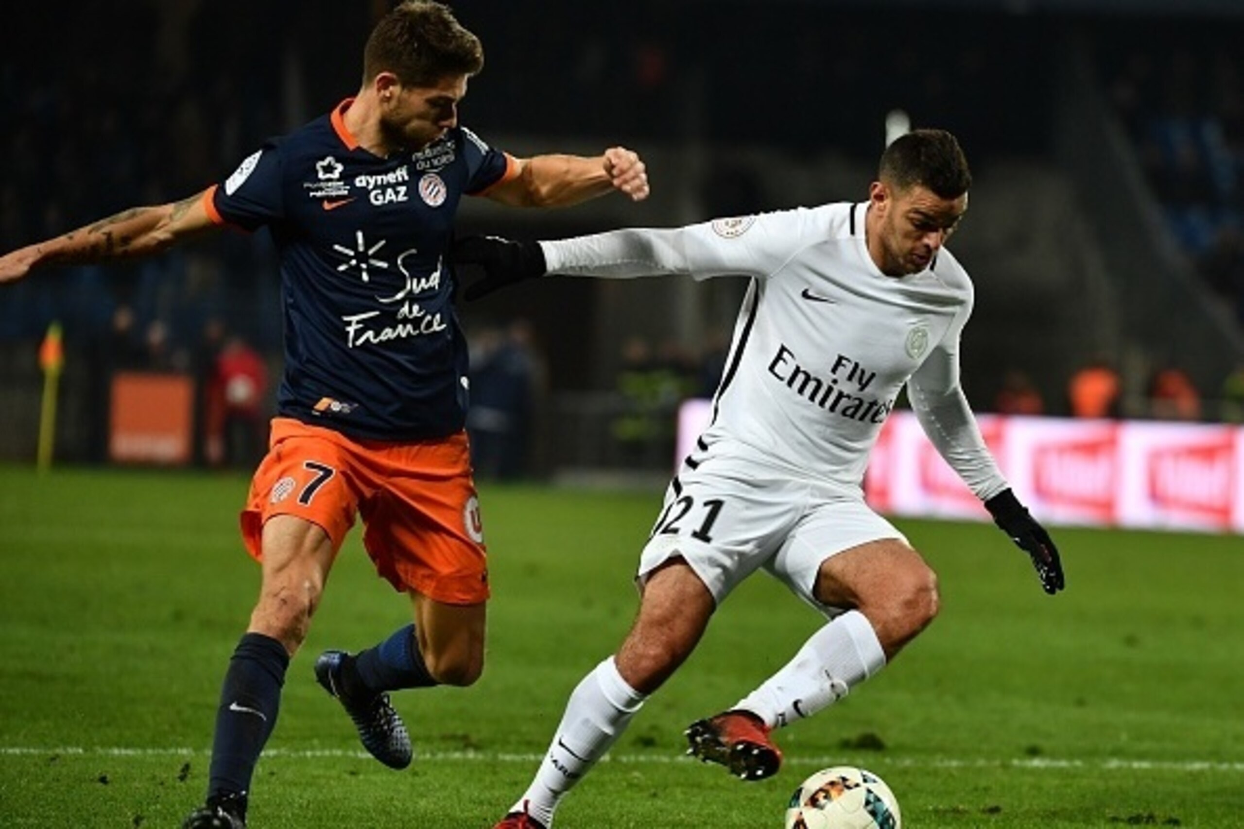 Montpellier's French midfielder Paul Lasne (L) vies with Paris Saint-Germain's French forward Hatem Ben Arfa during the French L1 football match between MHSC Montpellier and Paris Saint-Germain (PSG) on December 3, 2016 at the La Mosson Stadium in Montpe Montpellier's French midfielder Paul Lasne (L) vies with Paris Saint-Germain's French forward Hatem Ben Arfa during the French L1 football match between MHSC Montpellier and Paris Saint-Germain (PSG) on December 3, 2016 at the La Mosson Stadium in Montpe