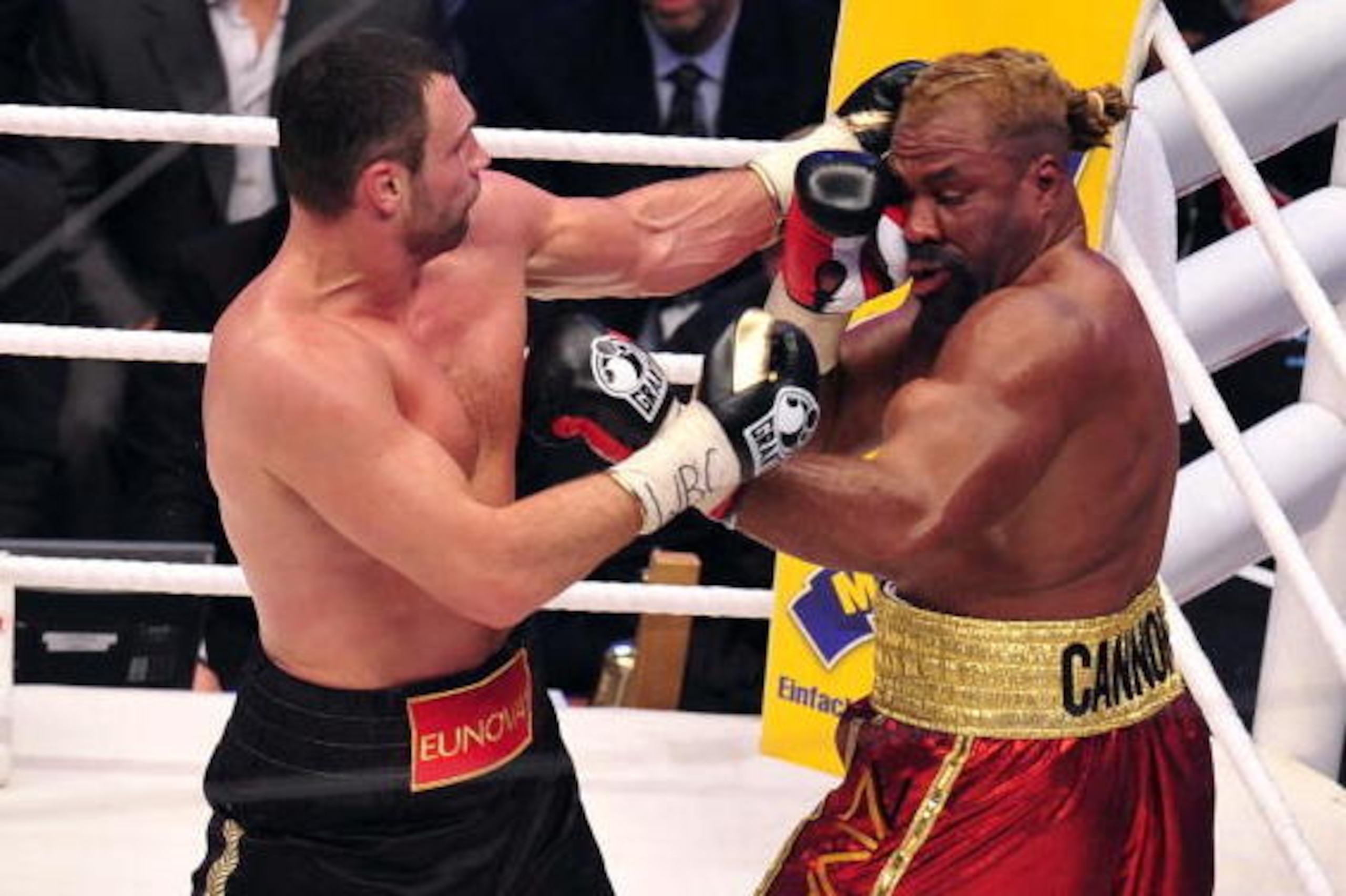 Ukrainian boxer Vitali Klitschko (L) fights with US boxer Shannon Briggs during the WBC heavyweight boxing title in Hamburg on October 16, 2010. Klitschko won the fight. AFP PHOTO/PATRICK LUX (Photo credit should read PATRICK LUX/AFP/Getty Images) Ukrainian boxer Vitali Klitschko (L) fights with US boxer Shannon Briggs during the WBC heavyweight boxing title in Hamburg on October 16, 2010. Klitschko won the fight. AFP PHOTO/PATRICK LUX (Photo credit should read PATRICK LUX/AFP/Getty Images)