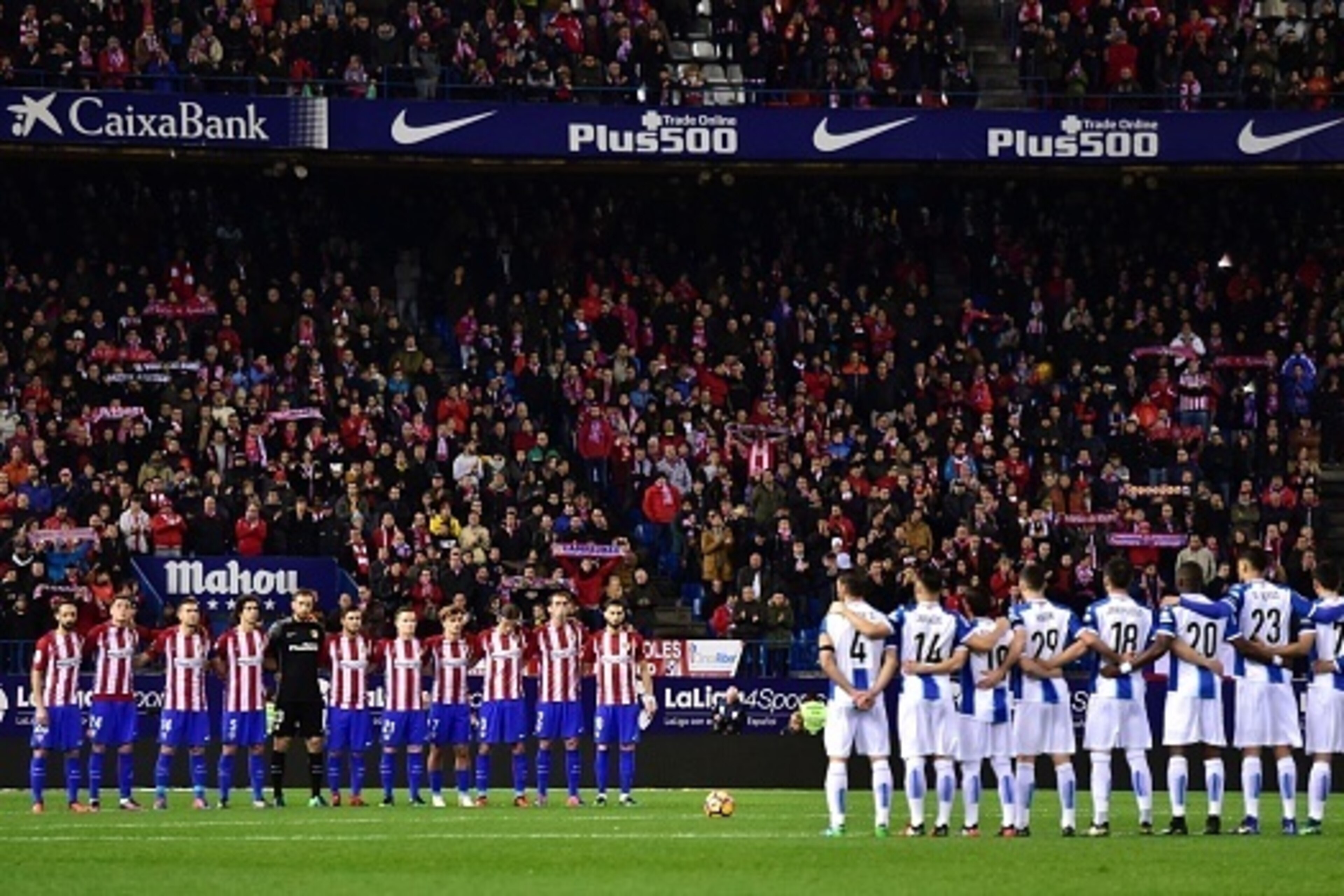 Atletico Madrid's and Espanyol's players observe a minute of silence to remember the victims of the Chapecoense football team before the Spanish league football match Club Atletico de Madrid vs RCD Espanyol at the Vicente Calderon stadium in Madrid on Dec Atletico Madrid's and Espanyol's players observe a minute of silence to remember the victims of the Chapecoense football team before the Spanish league football match Club Atletico de Madrid vs RCD Espanyol at the Vicente Calderon stadium in Madrid on Dec