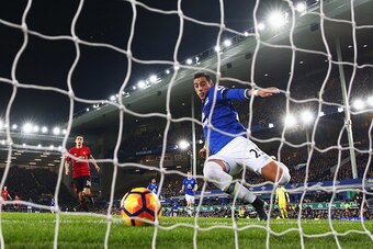 LIVERPOOL, ENGLAND - DECEMBER 04:  Ramiro Funes Mori of Everton fails to stop the ball crossing the line as Zlatan Ibrahimovic of Manchester United scores their first goal during the Premier League match between Everton and Manchester United at Goodison P