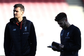 BOURNEMOUTH, ENGLAND - DECEMBER 04:  Dejan Lovren of Liverpool speaks with Adam Lallana of Liverpool during the Premier League match between AFC Bournemouth and Liverpool at Vitality Stadium on December 4, 2016 in Bournemouth, England.  (Photo by Bryn Len