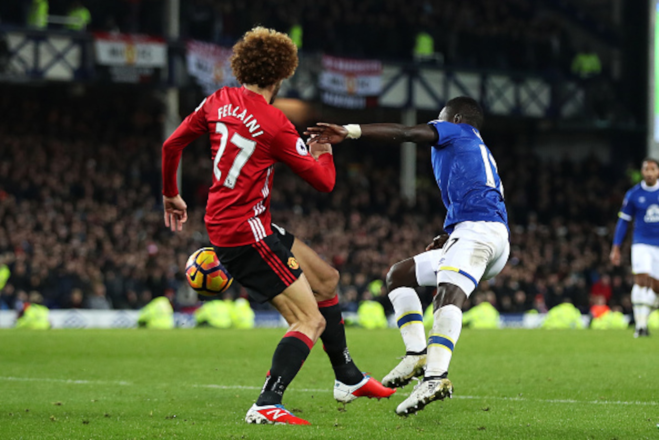 LIVERPOOL, ENGLAND - DECEMBER 04: Marouane Fellaini of Manchester United fouls Idrissa Gueye of Everton in the penalty box during the Premier League match between Everton and Manchester United at Goodison Park on December 4, 2016 in Liverpool, England. LIVERPOOL, ENGLAND - DECEMBER 04: Marouane Fellaini of Manchester United fouls Idrissa Gueye of Everton in the penalty box during the Premier League match between Everton and Manchester United at Goodison Park on December 4, 2016 in Liverpool, England.