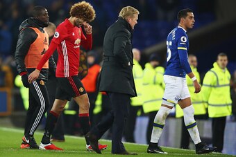 LIVERPOOL, ENGLAND - DECEMBER 04:  Marouane Fellaini of Manchester United (2L) looks dejected after the Premier League match between Everton and Manchester United at Goodison Park on December 4, 2016 in Liverpool, England.  (Photo by Clive Brunskill/Getty