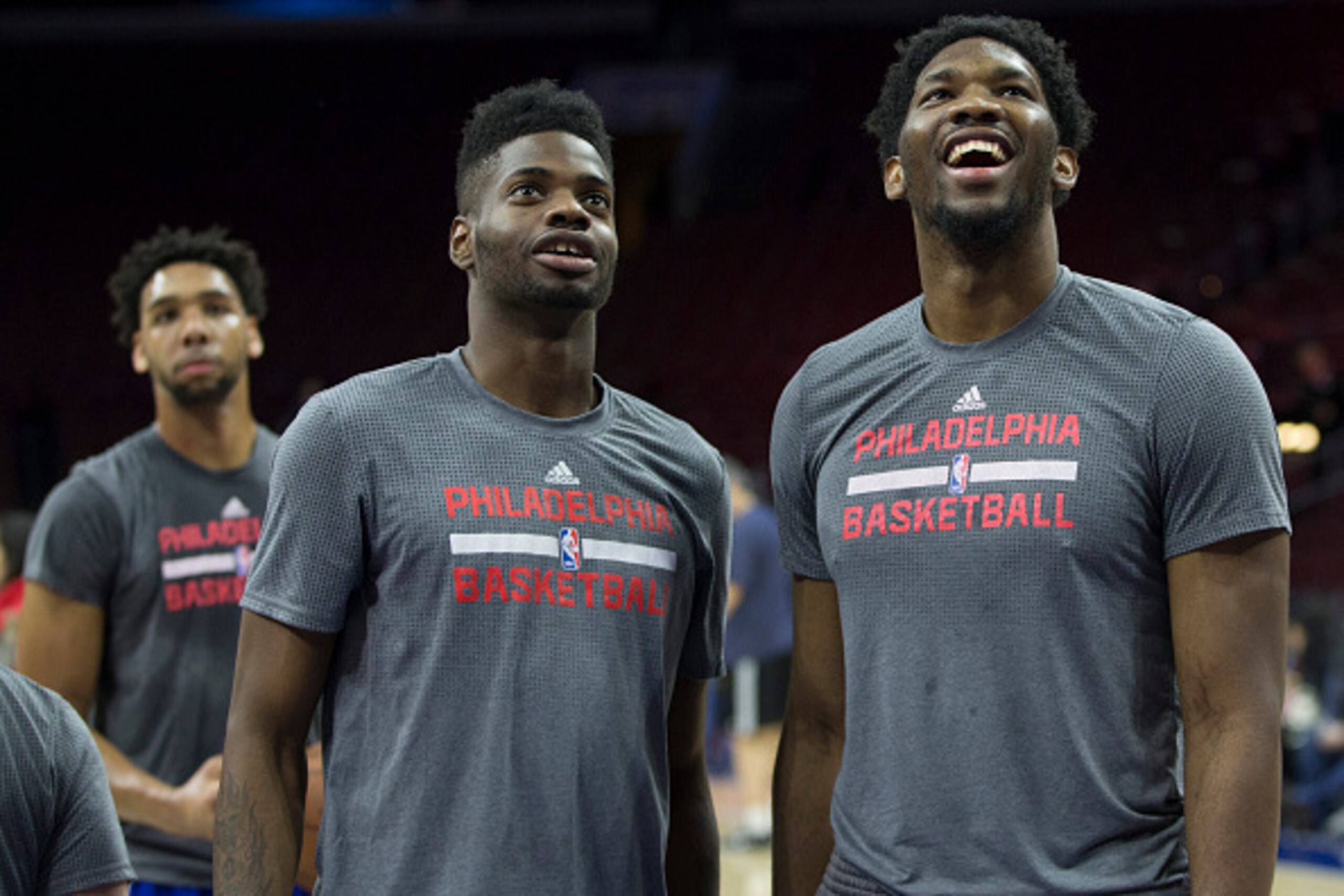 PHILADELPHIA, PA - DECEMBER 22: Jahlil Okafor #8, Nerlens Noel #4, and Joel Embiid #21 of the Philadelphia 76ers warm up prior to the game against the Memphis Grizzlies on December 22, 2015 at the Wells Fargo Center in Philadelphia, Pennsylvania. NOTE TO 