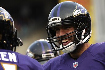 BALTIMORE, MD - DECEMBER 4: Quarterback Joe Flacco #5 of the Baltimore Ravens celebrates after throwing a touchdown pass to teammate wide receiver Breshad Perriman #18 (not pictured) in the fourth quarter against the Miami Dolphins at M&T Bank Stadium on 