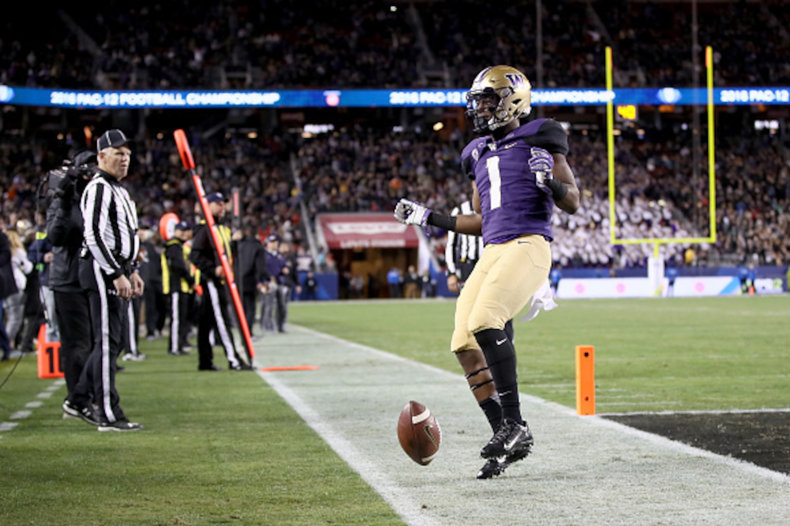 SANTA CLARA, CA - DECEMBER 02:  John Ross #1 of the Washington Huskies reacts after scoring a touchdown against the Colorado Buffaloes during the Pac-12 Championship game at Levi's Stadium on December 2, 2016 in Santa Clara, California.  (Photo by Robert 