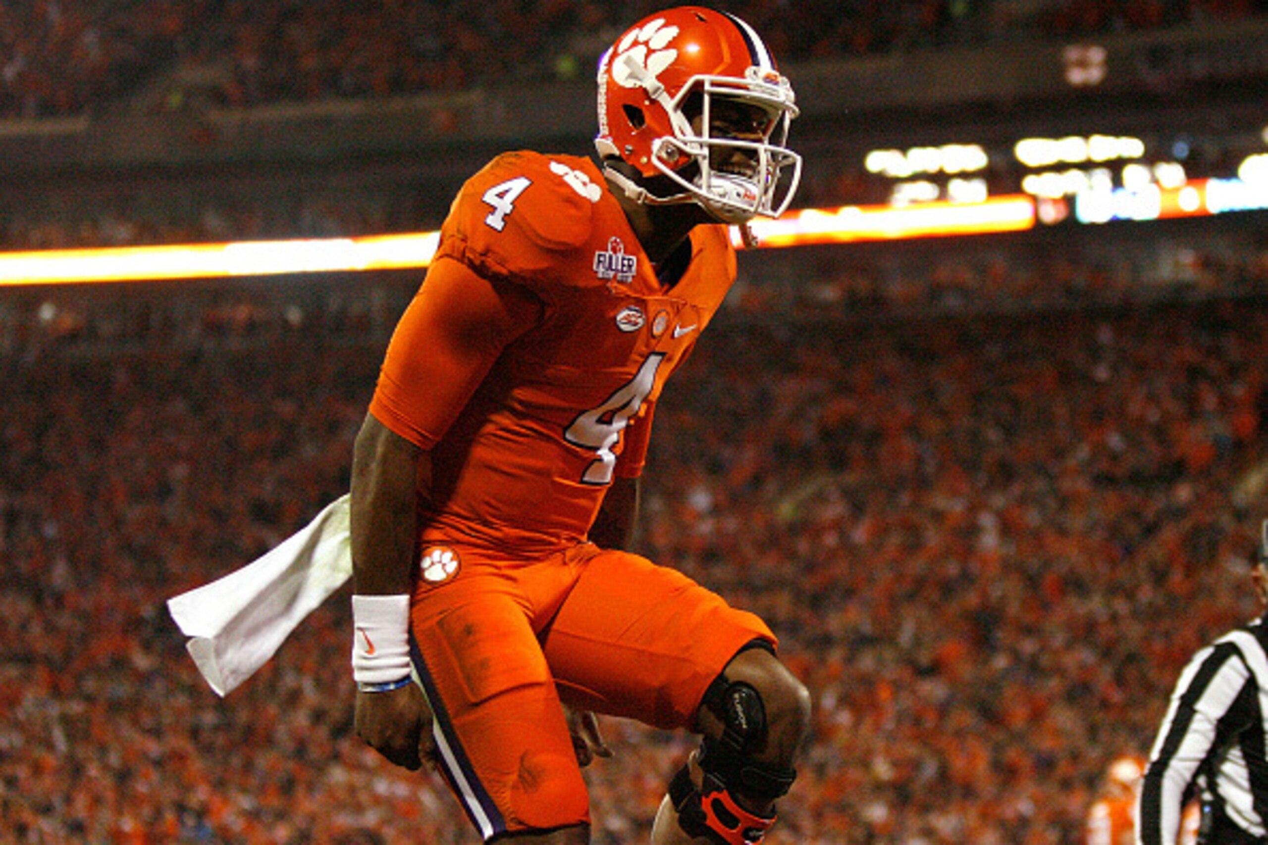CLEMSON, SC - NOVEMBER 26: Deshaun Watson #4 of the Clemson Tigers reacts after a touchdown during the game against the South Carolina Gamecocks at Memorial Stadium on November 26, 2016 in Clemson, South Carolina.  (Photo by Tyler Smith/Getty Images)