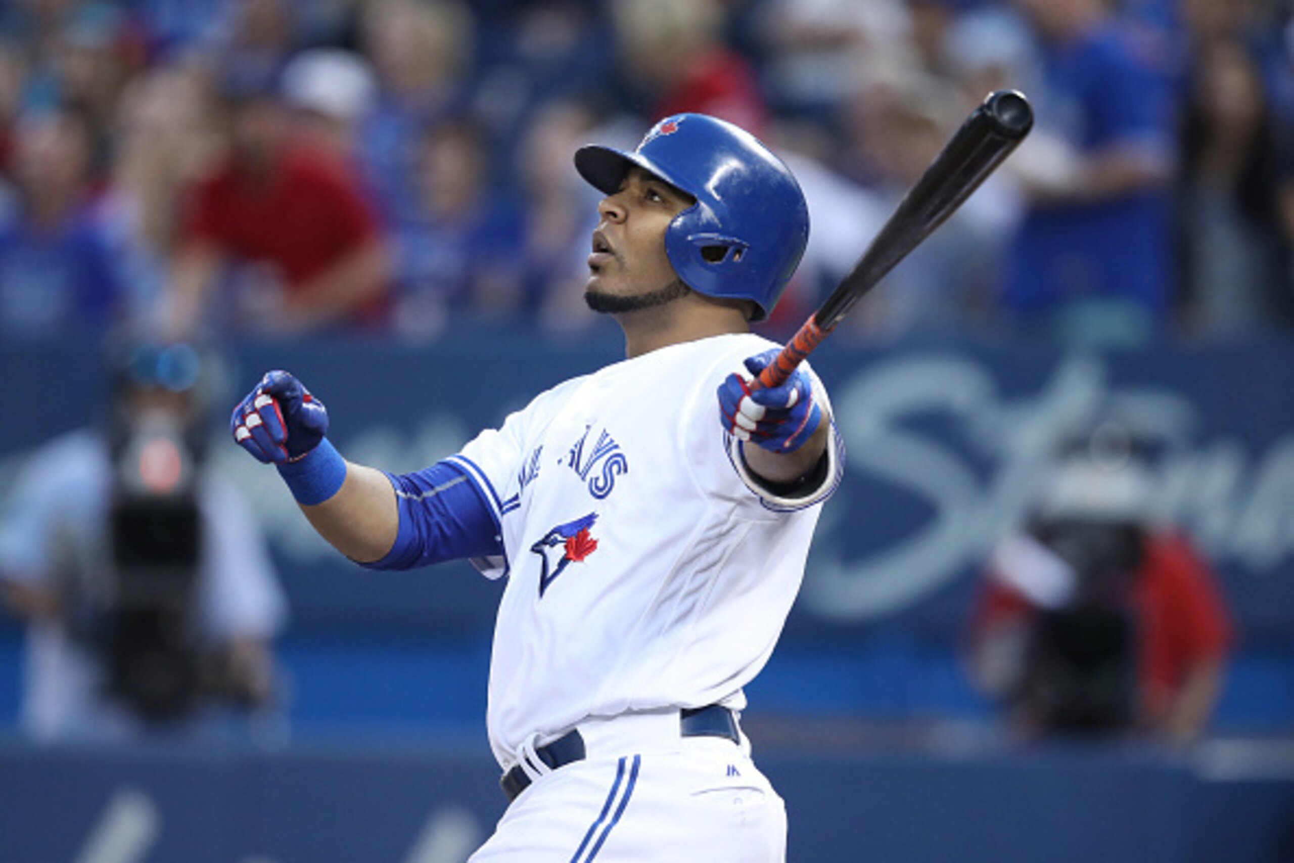 TORONTO, CANADA - SEPTEMBER 13: Edwin Encarnacion #10 of the Toronto Blue Jays watches his deep fly ball as he flies out to the wall in the first inning during MLB game action against the Tampa Bay Rays on September 13, 2016 at Rogers Centre in Toronto, O