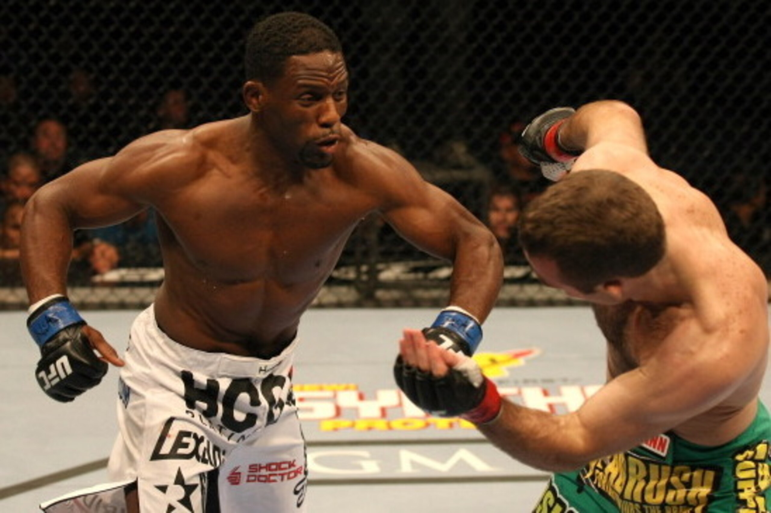 LAS VEGAS - JANUARY 01:  Antonio McKee (L) punches towards Jacob Volkmann at UFC 125: Resolution at the MGM Grand Garden Arena on January 1, 2011 in Las Vegas, Nevada.  (Photo by Donald Miralle/Zuffa LLC/Zuffa LLC via Getty Images)