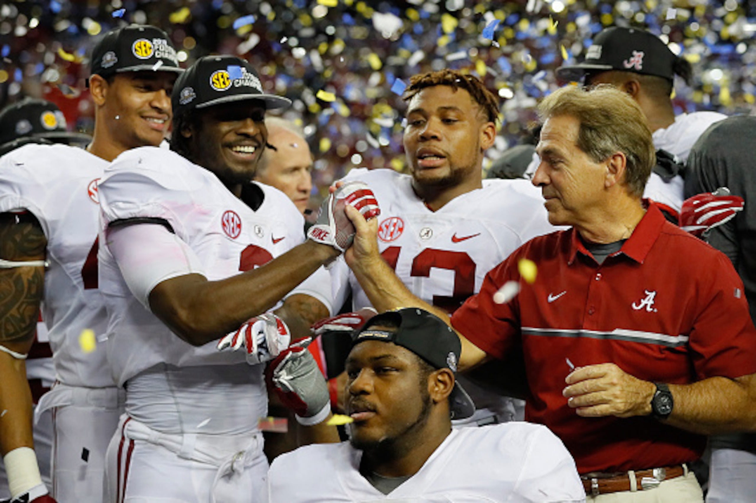 ATLANTA, GA - DECEMBER 03: Head coach Nick Saban of the Alabama Crimson Tide celebrates with his team after their 54 to 16 win over the Florida Gators in the SEC Championship game at the Georgia Dome on December 3, 2016 in Atlanta, Georgia. (Photo by Ke ATLANTA, GA - DECEMBER 03: Head coach Nick Saban of the Alabama Crimson Tide celebrates with his team after their 54 to 16 win over the Florida Gators in the SEC Championship game at the Georgia Dome on December 3, 2016 in Atlanta, Georgia. (Photo by Ke