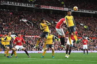 MANCHESTER, ENGLAND - NOVEMBER 19: Francis Coquelin of Arsenal (R) heads the ball away during the Premier League match between Manchester United and Arsenal at Old Trafford on November 19, 2016 in Manchester, England.  (Photo by Shaun Botterill/Getty Imag