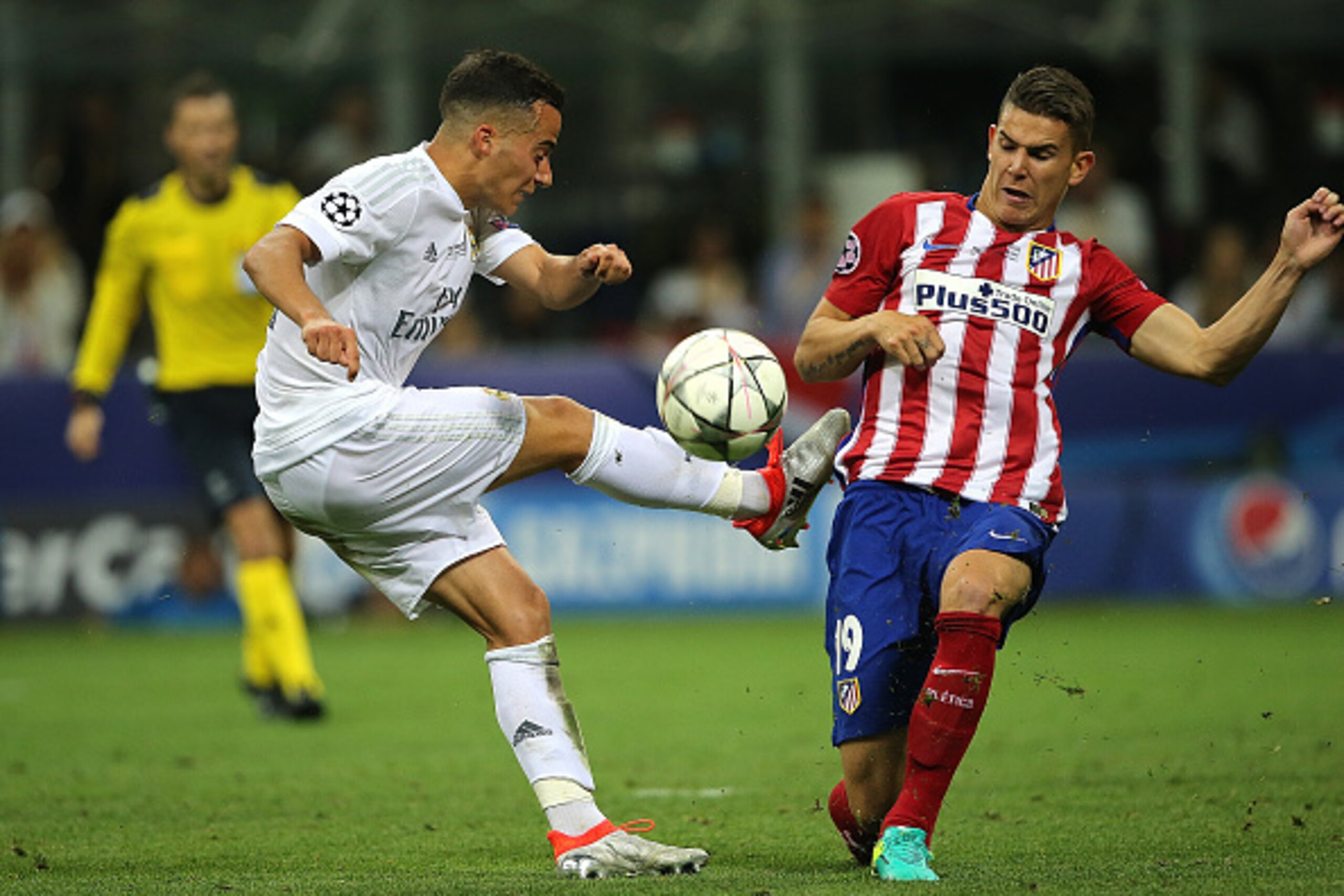 MILAN, ITALY - MAY 28: Lucas Hernandez of Atletico Madrid competes with Luca Vazquez of Real Madrid during the UEFA Champions League final match between Real Madrid and Club Atletico de Madrid at Stadio Giuseppe Meazza on May 28, 2016 in Milan, Italy. ( MILAN, ITALY - MAY 28: Lucas Hernandez of Atletico Madrid competes with Luca Vazquez of Real Madrid during the UEFA Champions League final match between Real Madrid and Club Atletico de Madrid at Stadio Giuseppe Meazza on May 28, 2016 in Milan, Italy. (